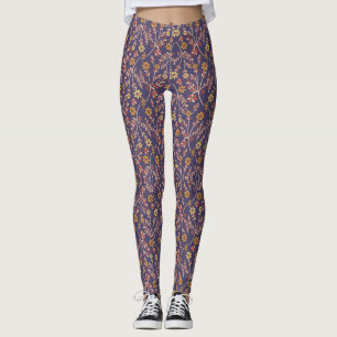 Grillig bloemontwerp met ranken op paarse achtergr leggings
