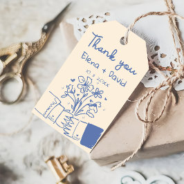 Grillige met de hand getekende blauwe bloemige tro cadeaulabel