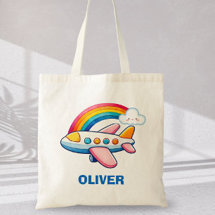 Grillige passagiersvliegtuig met regenboog tote bag