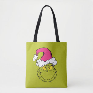 Grinch in roze kerstmuts tote bag