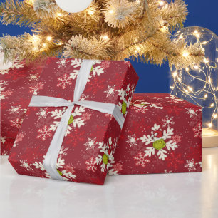 Grinch rood sneeuwvlokpatroon cadeaupapier