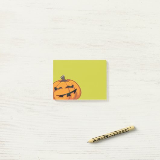 Grinning Halloween Pumpkin Post-it® notes (Op bureau)