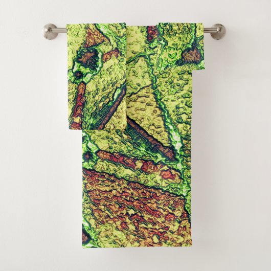 Groen bleek geel geverfd vulkanisch steenvormig on bad handdoek (Insitu)