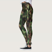 Groen, donkerst met het effect van veren. leggings (Links)