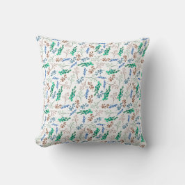 Groen en blauw botanisch patroon op wit kussen