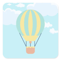 Groen en Geel Hete luchtballon in de Hemel