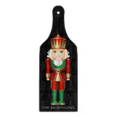 Groen en gouden hardkraker op zwarte snijplaat snijplank (Voorkant)