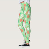 Groen en Oranje Tropisch Vloeiingspatroon Leggings (Links)