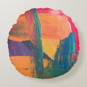 Groen, geel en rood abstract schilderij rond kussen