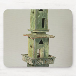 Groen geglazuurd model van een toren muismat