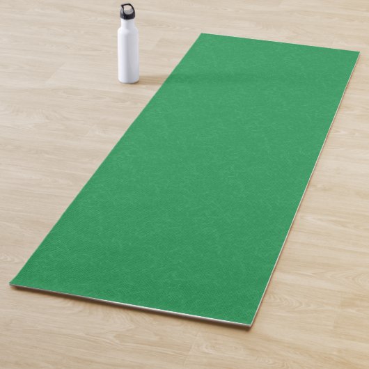 Groen gestructureerd oppervlak met wervelend patro yogamat (In situ)