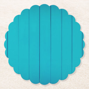 Groen getextureerd wandpatroon met turquoise kartonnen onderzetters