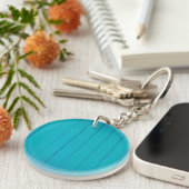 Groen getextureerd wandpatroon met turquoise sleutelhanger (Voorkant Rechts)