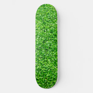 Groen gras persoonlijk skateboard