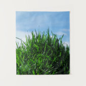 Groen gras tegen de achtergrond van het eindeloze wandkleed (Voorkant)