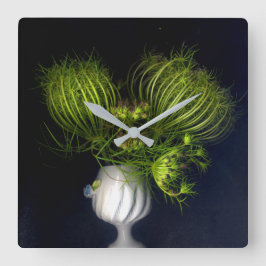 Groen hart in zwart vierkante klok