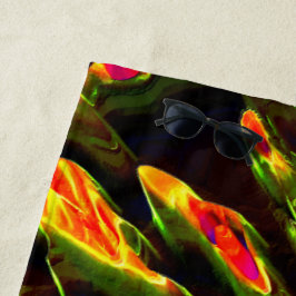 Groen in brand gedraaid strandlaken