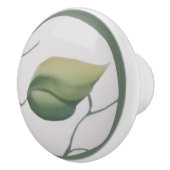 Groen lef op de achtergrond van Cream Keramische Knop (Rechts)