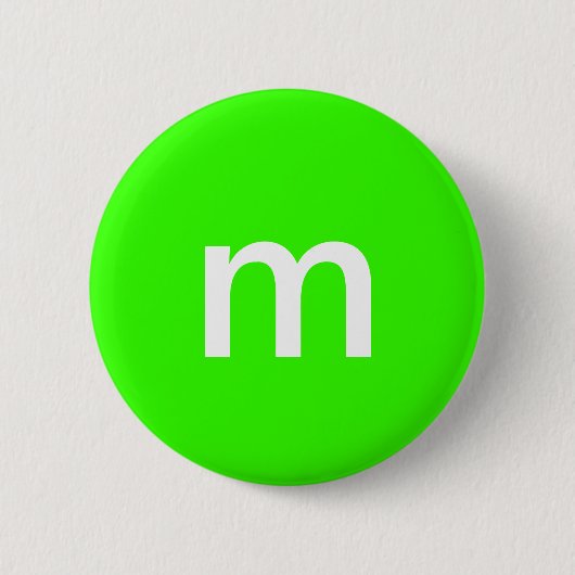 Groen m&m ronde button 5,7 cm (Voorkant)