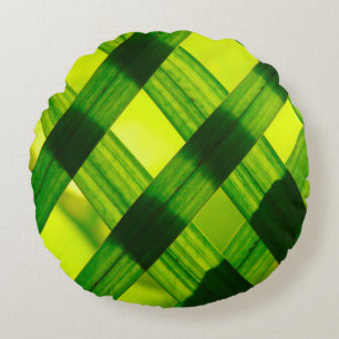 Groen plant met bladgroengras rond kussen