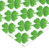Groen vierbladig klaverpatroon op wit tafelkleed (Gekanteld)