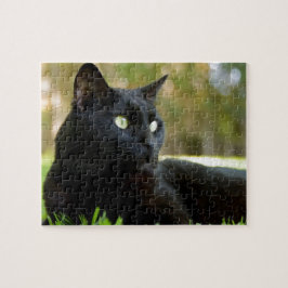 Groen zwart kat in de buitenlucht legpuzzel