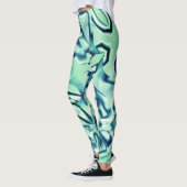 Groenblauwe, gebogen vormen met munttonen leggings (Links)