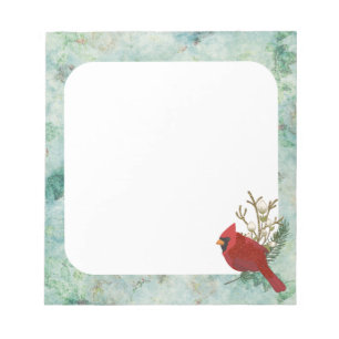 Groene achtergrond met rode kardinaal notitieblok