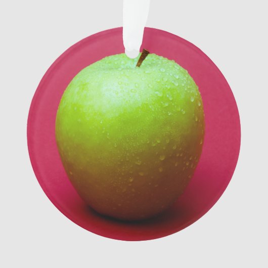 Groene appel op rode achtergrond ornament (voorkant)
