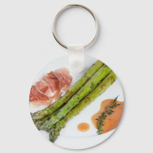 Groene asperges met ham en saus sleutelhanger