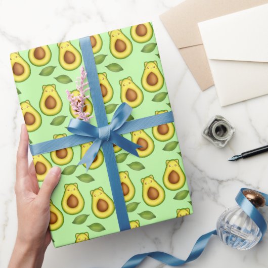 Groene avocado kat cadeaupapier (Geschenken)