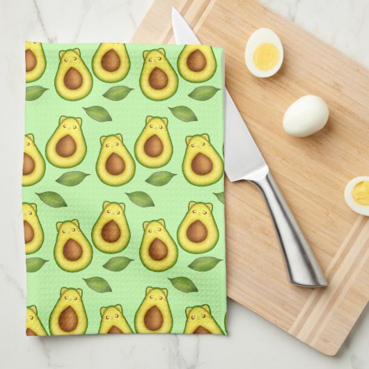 Groene avocado kat theedoek (Quarter Fold)