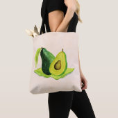 Groene Avocado, nog steeds levend fruit in Waterve Tote Bag (Dichtbij)