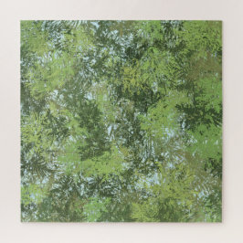 Groene bladbomen met blauwe lucht die door de kuns legpuzzel