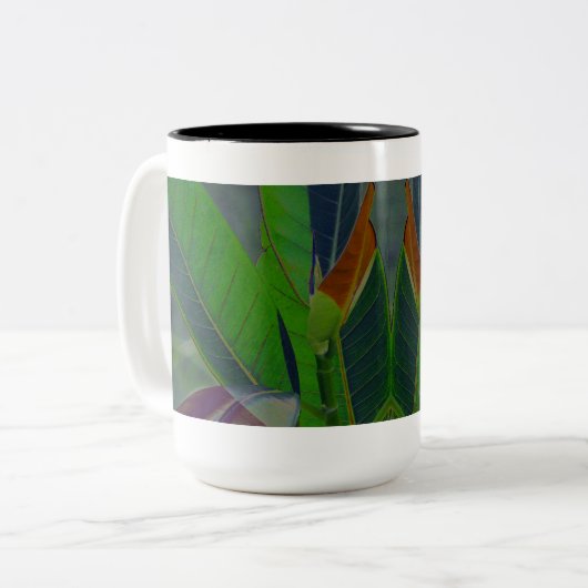 Groene bladeren close-up tweekleurige koffiemok (Voorkant links)