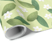 Groene bladeren en witte bloemen op groene achterg cadeaupapier (Rol Hoek)