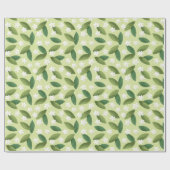 Groene bladeren en witte bloemen op groene achterg cadeaupapier (Vlak)