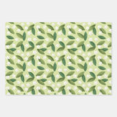 Groene bladeren en witte bloemen op groene achterg inpakpapier vel (Voorkant)