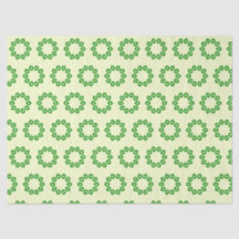 Groene bladeren in een cirkel op geel