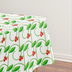 Groene bladeren met kleine rode wilde bessen op wi tafelkleed