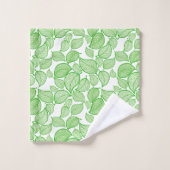 Groene bladeren op witte handdoek (Wasdoekje)