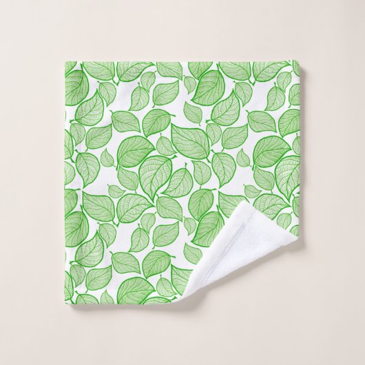 Groene bladeren op witte handdoek (Wasdoekje)