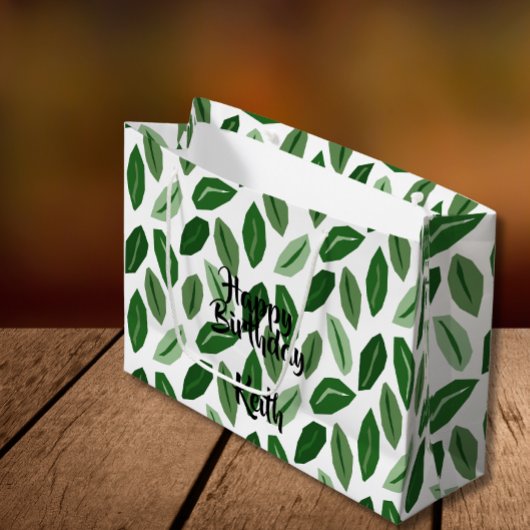 Groene bladeren op witte tas groot cadeauzakje