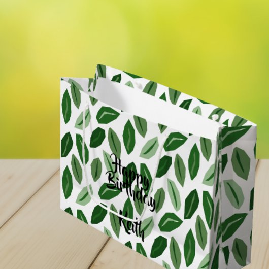 Groene bladeren op witte tas groot cadeauzakje