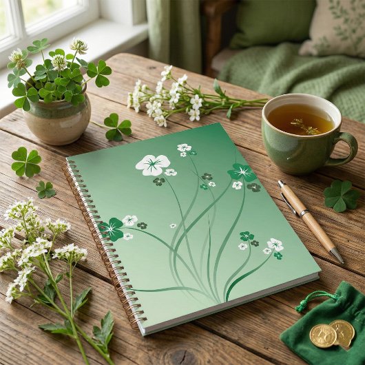 Groene bloemslingers en witte bloesems planner