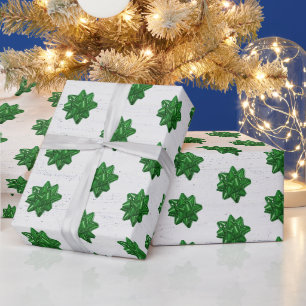 Groene bogen op withoutpakpapier cadeaupapier