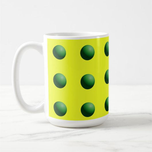 Groene bollen op geel koffiemok (Links)
