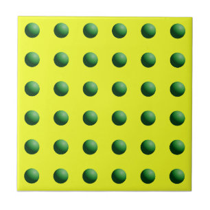 Groene bollen op geel tegeltje