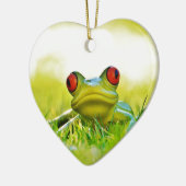 Groene boomkikker in de graskeramische sierplant keramisch ornament (Links)