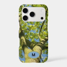 Groene boomkroon met monogram en foto met blauwe l